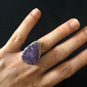 It is authentic and Sterling Silver